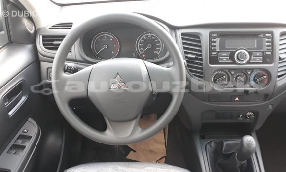 Buy Import Mitsubishi L200 White Car in Import - Dubai in Andijon Buy Import Mitsubishi L200 White Car in Import - Dubai in Andijon