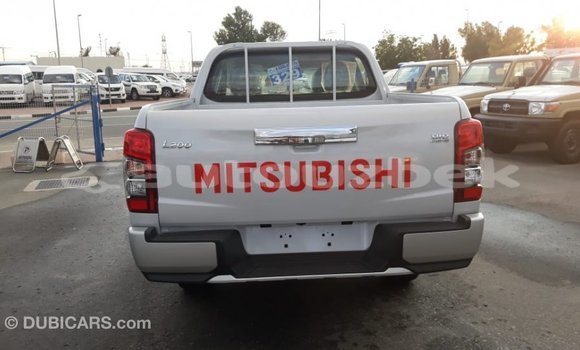 Buy Import Mitsubishi L200 White Car in Import - Dubai in Andijon Buy Import Mitsubishi L200 White Car in Import - Dubai in Andijon
