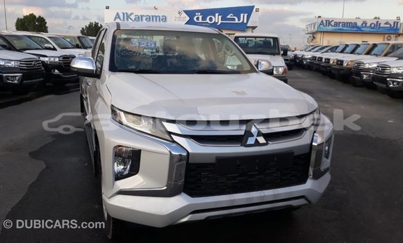Buy Import Mitsubishi L200 White Car in Import - Dubai in Andijon Buy Import Mitsubishi L200 White Car in Import - Dubai in Andijon