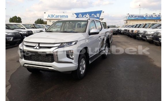 Buy Import Mitsubishi L200 White Car in Import - Dubai in Andijon Buy Import Mitsubishi L200 White Car in Import - Dubai in Andijon