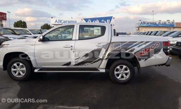 Buy Import Mitsubishi L200 White Car in Import - Dubai in Andijon Buy Import Mitsubishi L200 White Car in Import - Dubai in Andijon