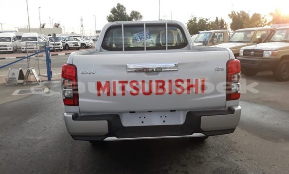 Buy Import Mitsubishi L200 White Car in Import - Dubai in Andijon Buy Import Mitsubishi L200 White Car in Import - Dubai in Andijon