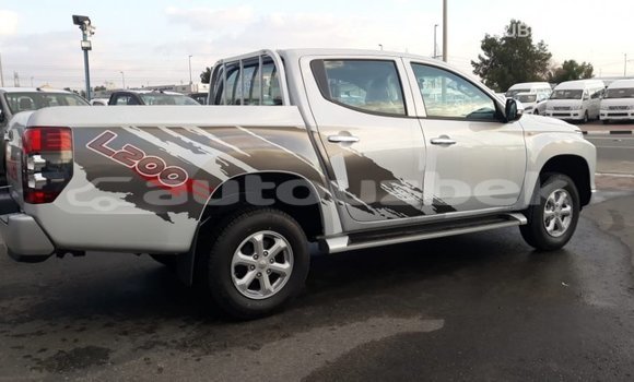 Buy Import Mitsubishi L200 White Car in Import - Dubai in Andijon Buy Import Mitsubishi L200 White Car in Import - Dubai in Andijon