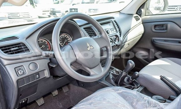 Buy Import Mitsubishi L200 White Car in Import - Dubai in Andijon Buy Import Mitsubishi L200 White Car in Import - Dubai in Andijon