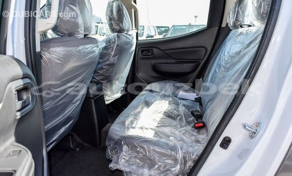 Buy Import Mitsubishi L200 White Car in Import - Dubai in Andijon Buy Import Mitsubishi L200 White Car in Import - Dubai in Andijon