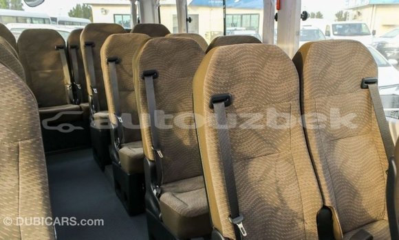 Buy Import Toyota Coaster White Car in Import - Dubai in Andijon Buy Import Toyota Coaster White Car in Import - Dubai in Andijon