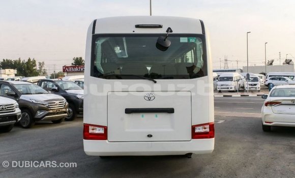 Buy Import Toyota Coaster White Car in Import - Dubai in Andijon Buy Import Toyota Coaster White Car in Import - Dubai in Andijon