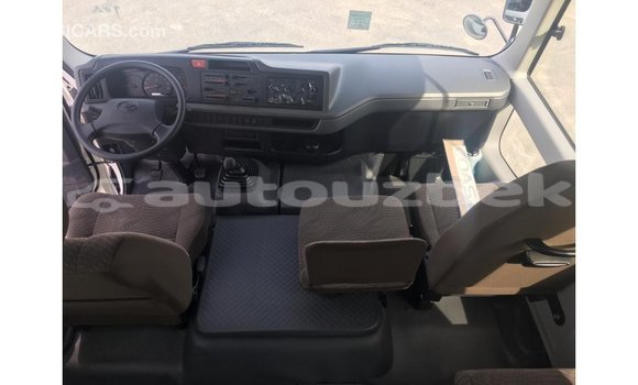 Buy Import Toyota Coaster White Car in Import - Dubai in Andijon Buy Import Toyota Coaster White Car in Import - Dubai in Andijon