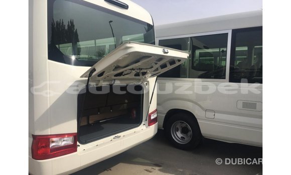 Buy Import Toyota Coaster White Car in Import - Dubai in Andijon Buy Import Toyota Coaster White Car in Import - Dubai in Andijon