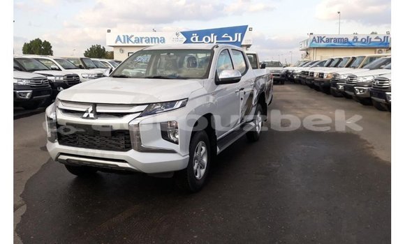 Buy Import Mitsubishi L200 White Car in Import - Dubai in Andijon Buy Import Mitsubishi L200 White Car in Import - Dubai in Andijon
