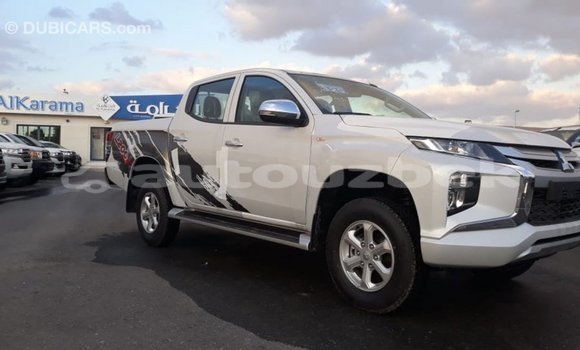 Buy Import Mitsubishi L200 White Car in Import - Dubai in Andijon Buy Import Mitsubishi L200 White Car in Import - Dubai in Andijon
