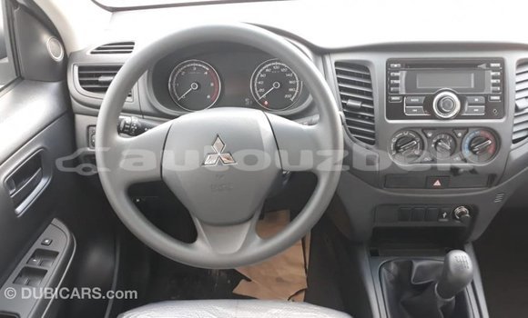 Buy Import Mitsubishi L200 White Car in Import - Dubai in Andijon Buy Import Mitsubishi L200 White Car in Import - Dubai in Andijon