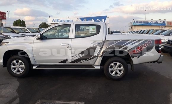 Buy Import Mitsubishi L200 White Car in Import - Dubai in Andijon Buy Import Mitsubishi L200 White Car in Import - Dubai in Andijon