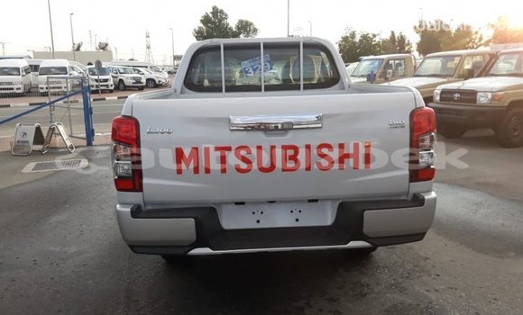 Buy Import Mitsubishi L200 White Car in Import - Dubai in Andijon Buy Import Mitsubishi L200 White Car in Import - Dubai in Andijon