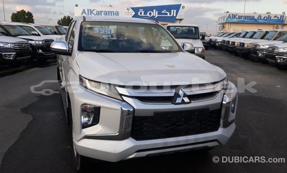 Buy Import Mitsubishi L200 White Car in Import - Dubai in Andijon Buy Import Mitsubishi L200 White Car in Import - Dubai in Andijon