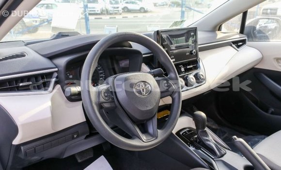 Buy Import Toyota Corolla White Car in Import - Dubai in Andijon Buy Import Toyota Corolla White Car in Import - Dubai in Andijon