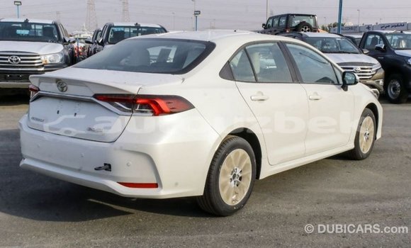 Buy Import Toyota Corolla White Car in Import - Dubai in Andijon Buy Import Toyota Corolla White Car in Import - Dubai in Andijon