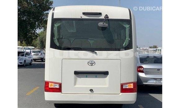 Buy Import Toyota Coaster White Car in Import - Dubai in Andijon Buy Import Toyota Coaster White Car in Import - Dubai in Andijon