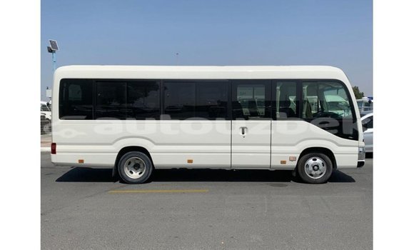 Buy Import Toyota Coaster White Car in Import - Dubai in Andijon Buy Import Toyota Coaster White Car in Import - Dubai in Andijon