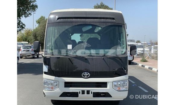 Buy Import Toyota Coaster White Car in Import - Dubai in Andijon Buy Import Toyota Coaster White Car in Import - Dubai in Andijon