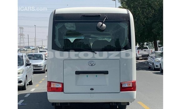 Buy Import Toyota Coaster White Car in Import - Dubai in Andijon Buy Import Toyota Coaster White Car in Import - Dubai in Andijon