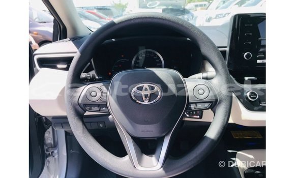 Buy Import Toyota Corolla White Car in Import - Dubai in Andijon Buy Import Toyota Corolla White Car in Import - Dubai in Andijon