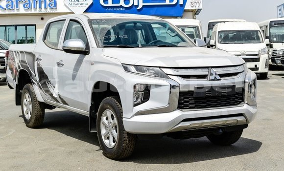 Buy Import Mitsubishi L200 White Car in Import - Dubai in Andijon Buy Import Mitsubishi L200 White Car in Import - Dubai in Andijon