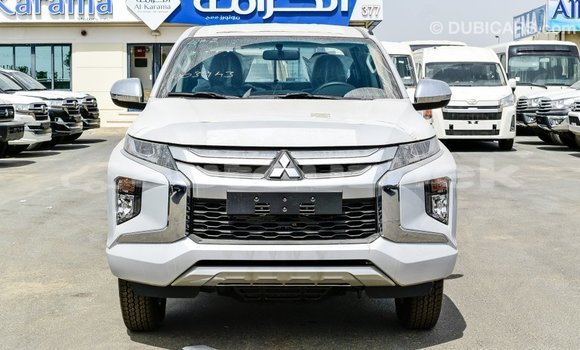 Buy Import Mitsubishi L200 White Car in Import - Dubai in Andijon Buy Import Mitsubishi L200 White Car in Import - Dubai in Andijon