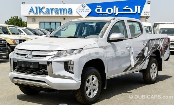 Buy Import Mitsubishi L200 White Car in Import - Dubai in Andijon Buy Import Mitsubishi L200 White Car in Import - Dubai in Andijon