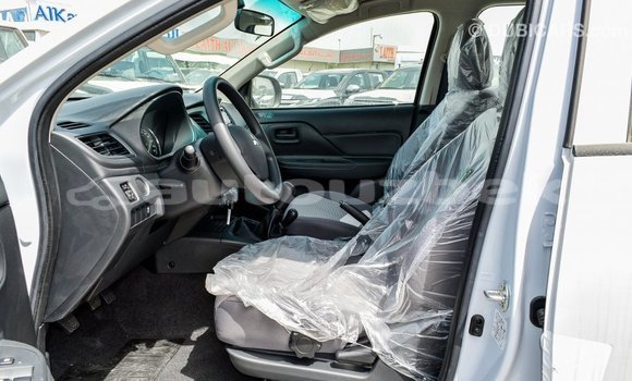Buy Import Mitsubishi L200 White Car in Import - Dubai in Andijon Buy Import Mitsubishi L200 White Car in Import - Dubai in Andijon