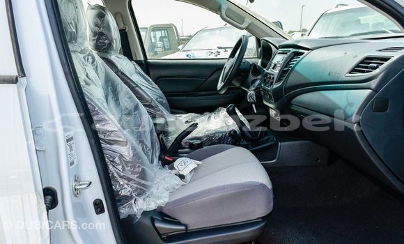 Buy Import Mitsubishi L200 White Car in Import - Dubai in Andijon Buy Import Mitsubishi L200 White Car in Import - Dubai in Andijon