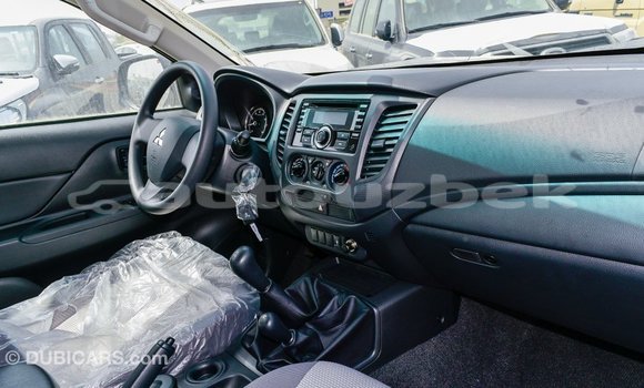 Buy Import Mitsubishi L200 White Car in Import - Dubai in Andijon Buy Import Mitsubishi L200 White Car in Import - Dubai in Andijon