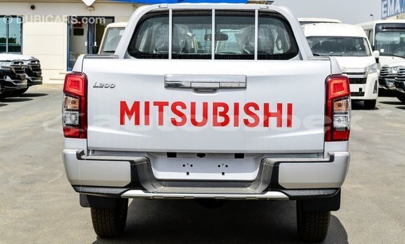 Buy Import Mitsubishi L200 White Car in Import - Dubai in Andijon Buy Import Mitsubishi L200 White Car in Import - Dubai in Andijon