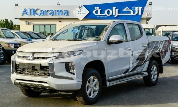 Buy Import Mitsubishi L200 White Car in Import - Dubai in Andijon Buy Import Mitsubishi L200 White Car in Import - Dubai in Andijon