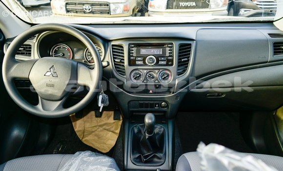 Buy Import Mitsubishi L200 White Car in Import - Dubai in Andijon Buy Import Mitsubishi L200 White Car in Import - Dubai in Andijon