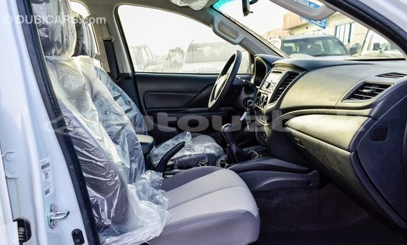 Buy Import Mitsubishi L200 White Car in Import - Dubai in Andijon Buy Import Mitsubishi L200 White Car in Import - Dubai in Andijon
