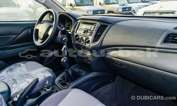 Buy Import Mitsubishi L200 White Car in Import - Dubai in Andijon Buy Import Mitsubishi L200 White Car in Import - Dubai in Andijon