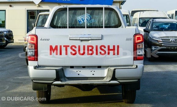 Buy Import Mitsubishi L200 White Car in Import - Dubai in Andijon Buy Import Mitsubishi L200 White Car in Import - Dubai in Andijon