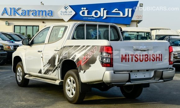 Buy Import Mitsubishi L200 White Car in Import - Dubai in Andijon Buy Import Mitsubishi L200 White Car in Import - Dubai in Andijon