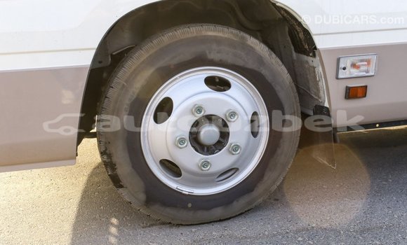 Buy Import Toyota Coaster White Car in Import - Dubai in Andijon Buy Import Toyota Coaster White Car in Import - Dubai in Andijon