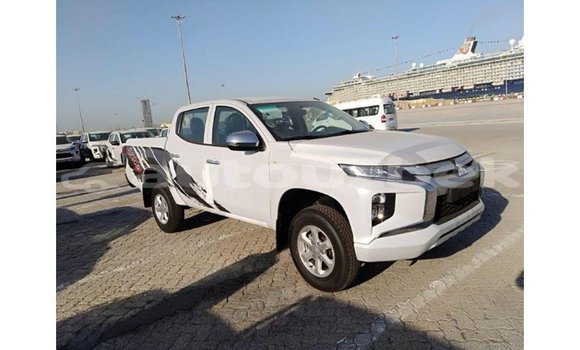 Buy Import Mitsubishi L200 White Car in Import - Dubai in Andijon Buy Import Mitsubishi L200 White Car in Import - Dubai in Andijon