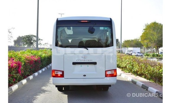 Buy Import Toyota Coaster White Car in Import - Dubai in Andijon Buy Import Toyota Coaster White Car in Import - Dubai in Andijon