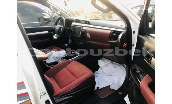 Buy Import Toyota Hilux White Car in Import - Dubai in Andijon Buy Import Toyota Hilux White Car in Import - Dubai in Andijon