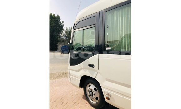 Buy Import Toyota Coaster White Car in Import - Dubai in Andijon Buy Import Toyota Coaster White Car in Import - Dubai in Andijon