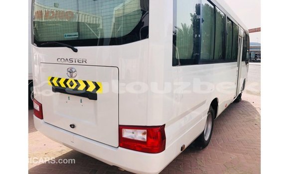 Buy Import Toyota Coaster White Car in Import - Dubai in Andijon Buy Import Toyota Coaster White Car in Import - Dubai in Andijon