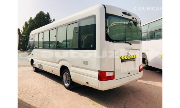 Buy Import Toyota Coaster White Car in Import - Dubai in Andijon Buy Import Toyota Coaster White Car in Import - Dubai in Andijon
