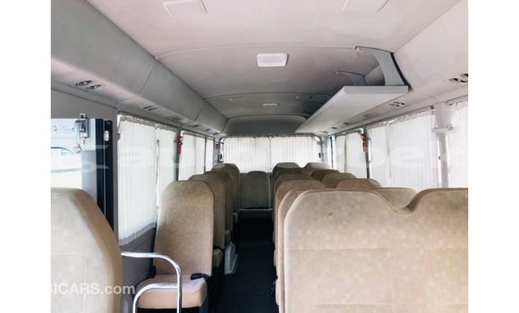 Buy Import Toyota Coaster White Car in Import - Dubai in Andijon Buy Import Toyota Coaster White Car in Import - Dubai in Andijon