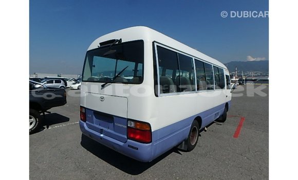 Buy Import Toyota Coaster White Car in Import - Dubai in Andijon Buy Import Toyota Coaster White Car in Import - Dubai in Andijon
