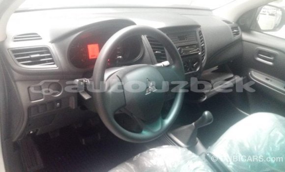 Buy Import Mitsubishi L200 White Car in Import - Dubai in Andijon Buy Import Mitsubishi L200 White Car in Import - Dubai in Andijon