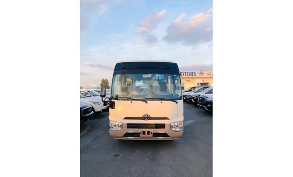 Buy Import Toyota Coaster White Car in Import - Dubai in Andijon Buy Import Toyota Coaster White Car in Import - Dubai in Andijon